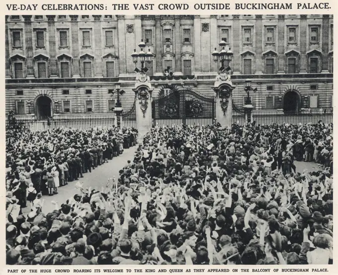 Crowds seen cheering and waving outside the gates of Buckingham Palace on May 8th 1945 (VE Day).  George V and Queen Mary with Princeses Elizabeth and Margaret can be seen at a distance acknowledging the crowds from the Buckingham Palace balcony.    They were later joined by Winston Churchill.  19 May 1945
