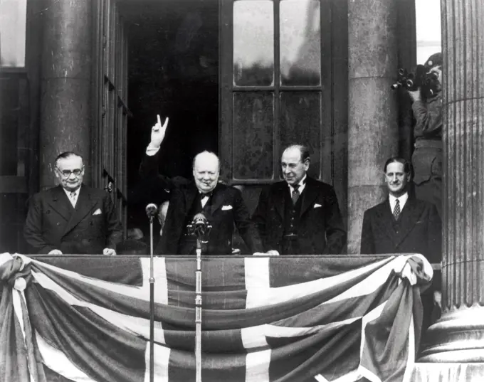 The photograph shows Winston Churchill and Ernest Bevin on the balcony of Buckingham Palace on VE Day.     Date: 8th May 1945