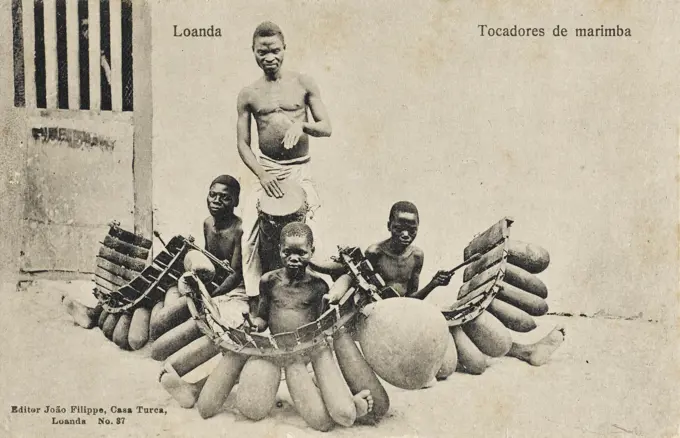 Luanda, Angola, Africa - A local band with seated Marimba players     Date: circa 1910s