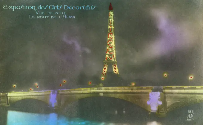1925 Exhibition of Decorative Arts - Paris - The car manufacturer Citroen places one of the most famous advertisements in history up the side of the Eiffel Tower! Night view including the Pont de L'Alma in the foreground.     Date: 1925