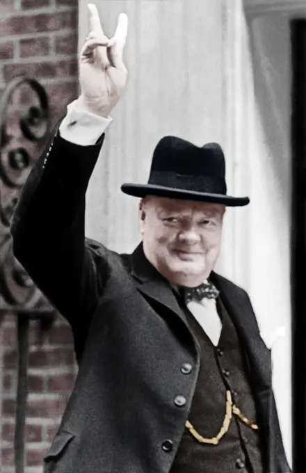 Winston Churchill (1874-1965) - Giving the V for Victory sign. Churchill was Prime Minister of the United Kingdon from 1940 to 1945 and again from 1951 to 1955.     Date: circa 1940