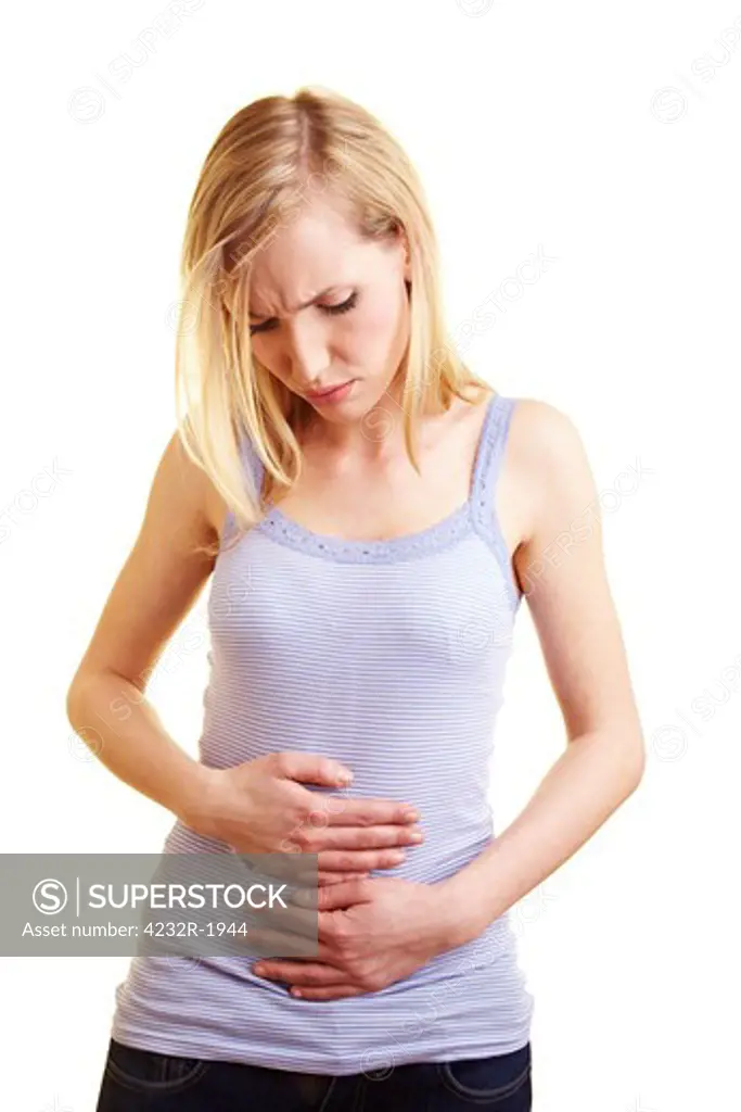 Young blonde woman with stomach ache holding her belly