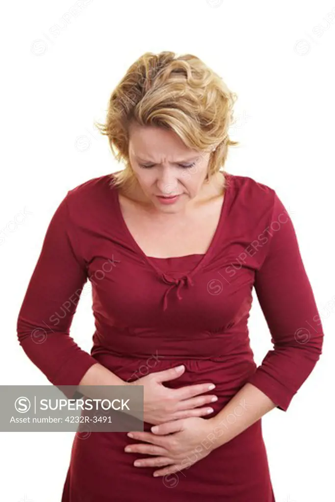 Woman holding her stomach with her hands