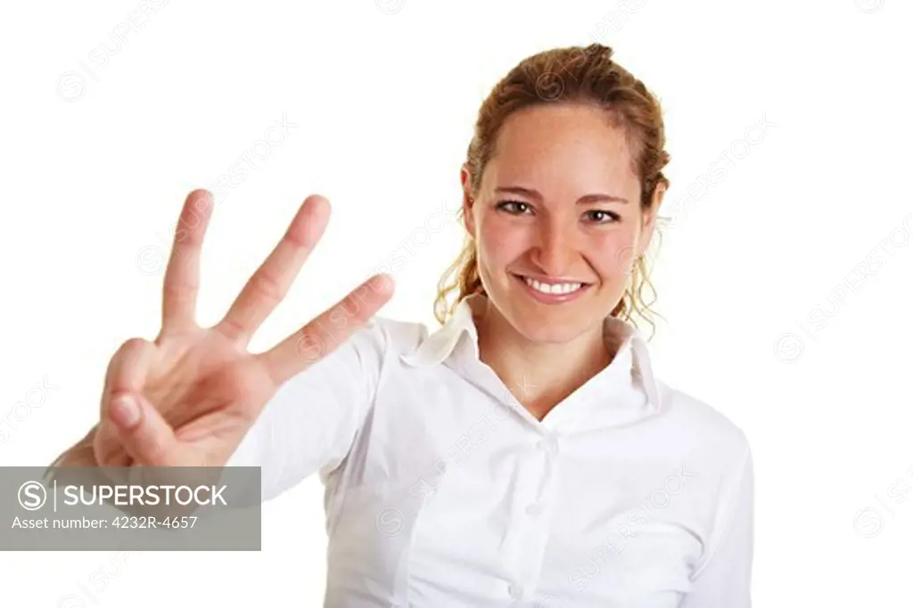 Smiling business woman showing three fingers of one hand