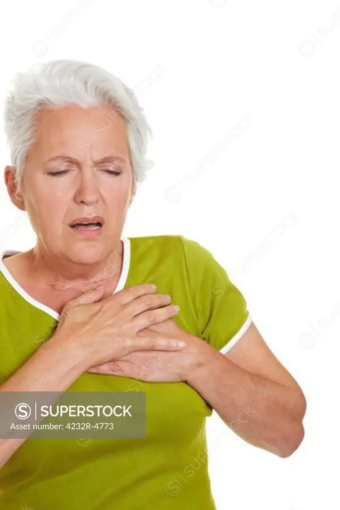 Senior woman having a heart attack and grabbing her chest