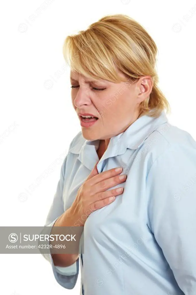 Business woman feeling heart pain and holding her chest