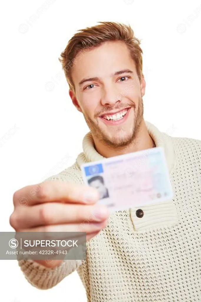 Happy smiling man with his European drivers licence