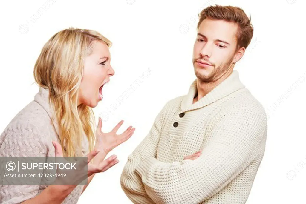 Angry woman screaming at man in a discussion