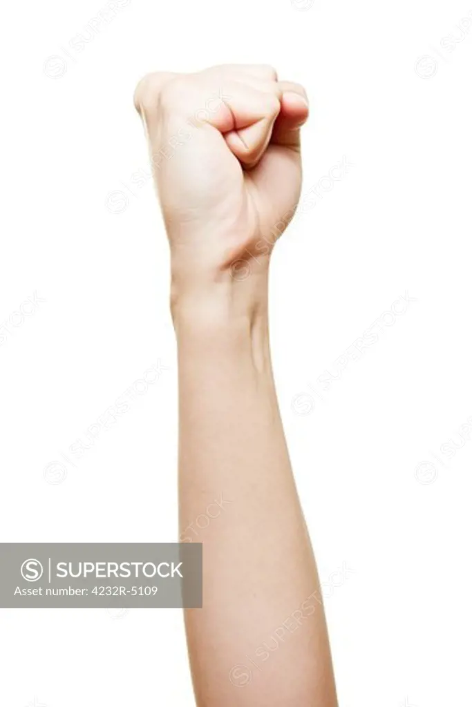 Clenched fist of a woman pointing up