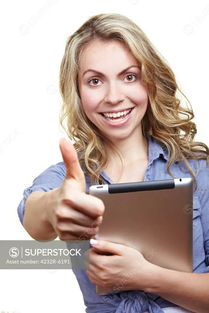 Happy blonde woman with tablet computer holding her thumbs up