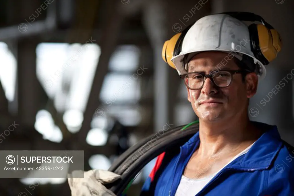 Portrait of an industrial worker in hardhat