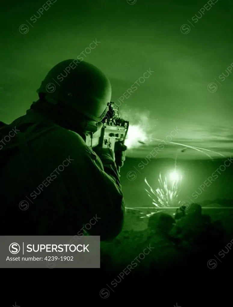 Night vision view of a special operations forces soldier firing his weapon during combat.