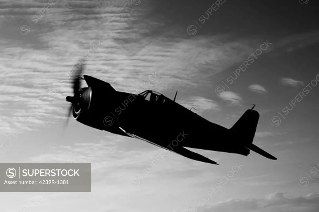A Grumman F6F Hellcat fighter plane in flight over Chino, California