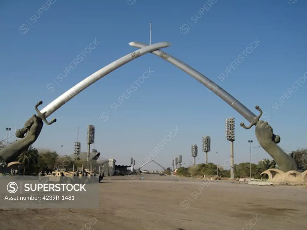 Baghdad, Iraq - Hands of Victory, These 24 ton blades are supposedly made from recast from the guns of dead Iranian Soldiers and moulded from an image of Saddam Hussiens forearms