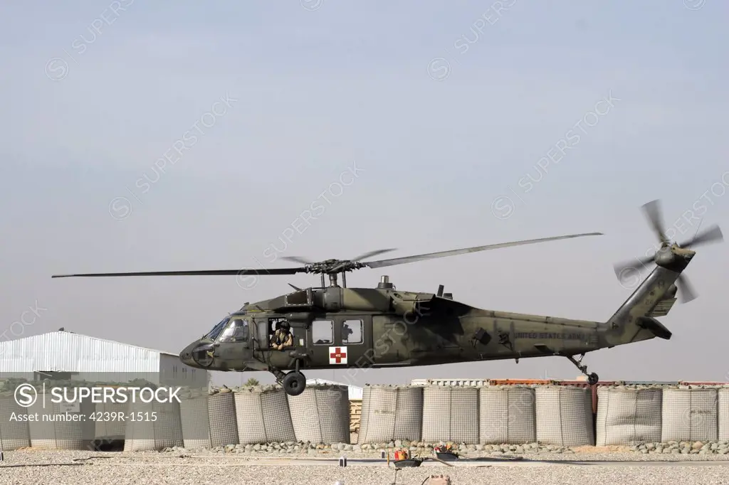 Baqubah, Iraq - A UH-60 Blackhawk prepares to land at Camp Warhorse to refuel