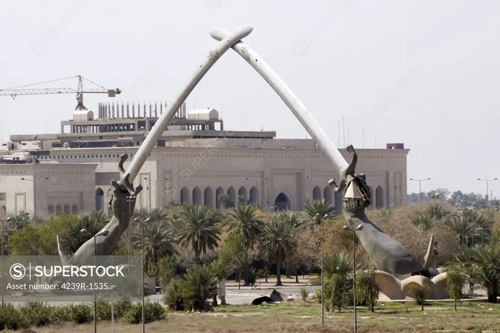 Baghdad, Iraq - Hands of Victory, These 24 ton blades are supposedly made from recast from the guns of dead Iranian soldiers and moulded from an image of Saddam Hussiens forearms