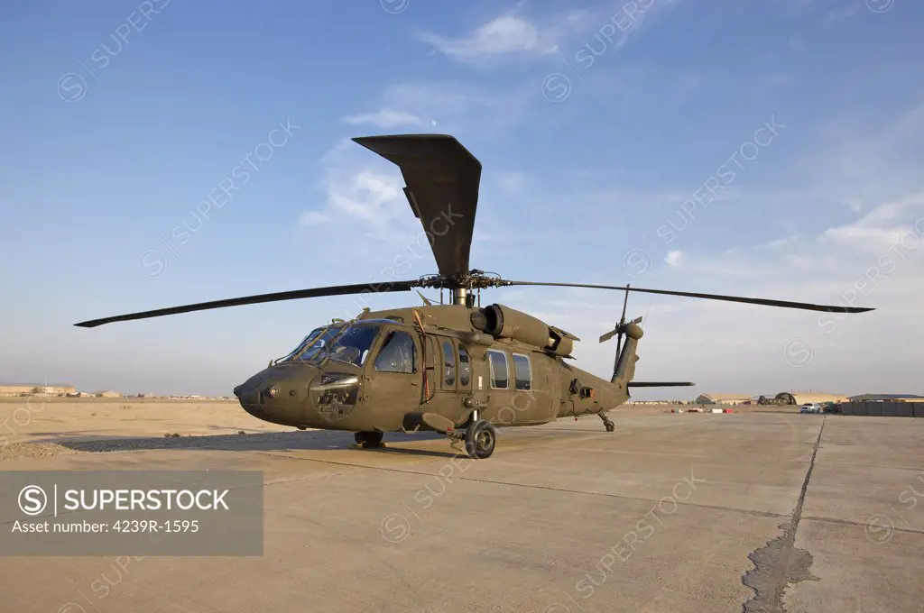 A UH-60 Black Hawk helicopter on the maintenance pad at Camp Speicher, Iraq