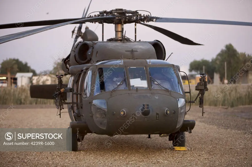 A UH-60L Black Hawk with twin M240G machine guns at the Victory Base Complex in Baghdad, Iraq