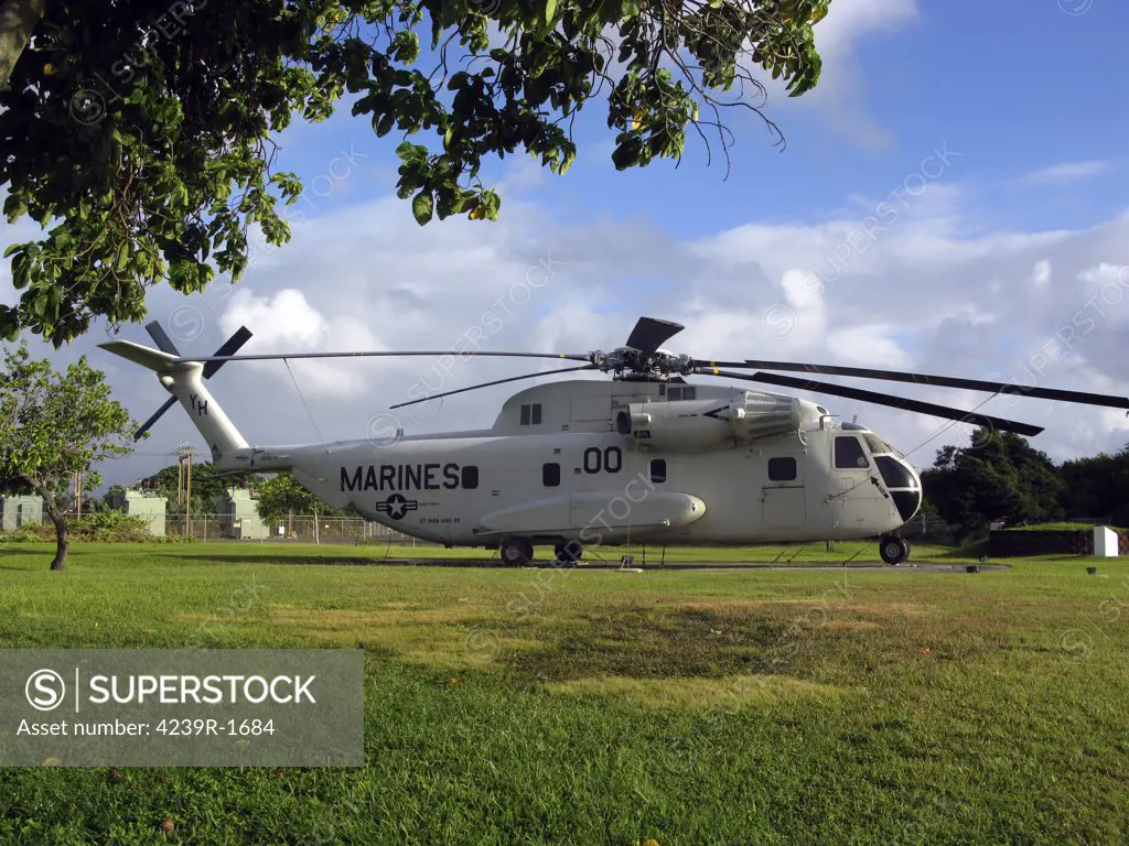 A USMC CH-53 Sea Stallion heavy lift transport helicopter on display near the entrance of the Marine Corps Air Station (MCAS) Kaneohe