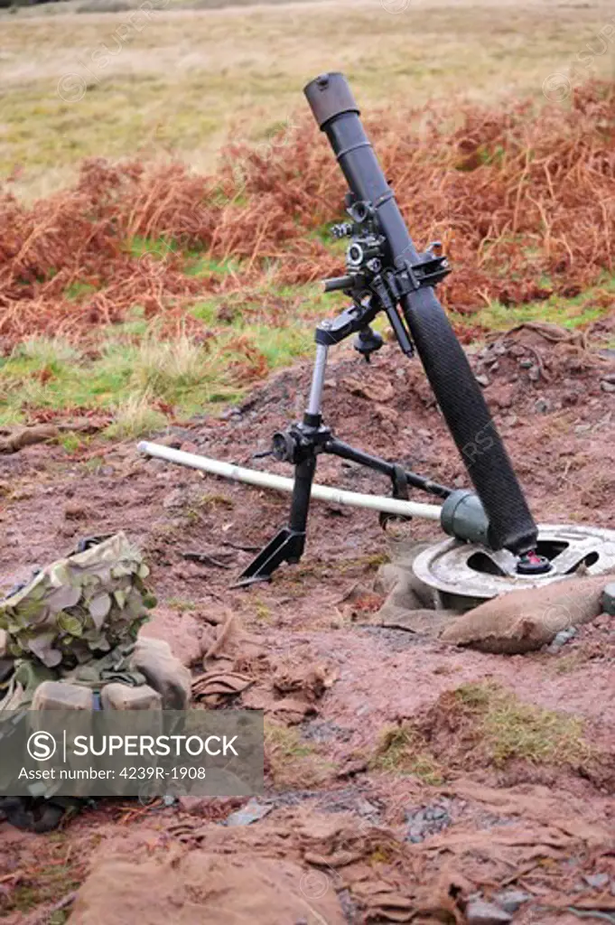 A British L16A2 81mm mortar tube.  The L16A2 81mm Mortar is a Battlegroup level indirect fire weapon which is capable of providing accurate High Explosive, smoke and illuminating rounds out to a maximum range of 5,650 meters.