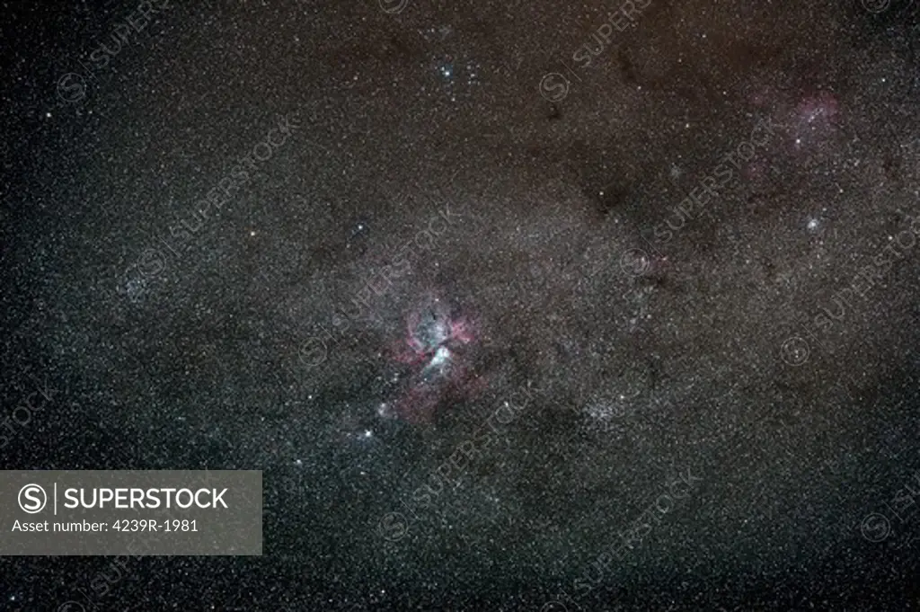 A wide field shot (15 degrees) centered on the Eta Carina nebula, featuring several southern deep sky objects like the southern pleiades and the Running Chicken Nebula.