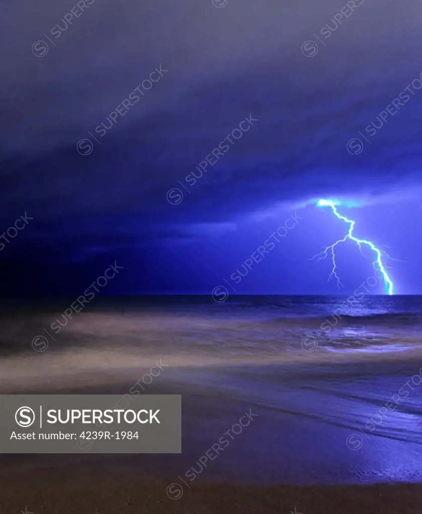 A bolt of lightning from an approaching storm at the beach in Miramar, Argentina.