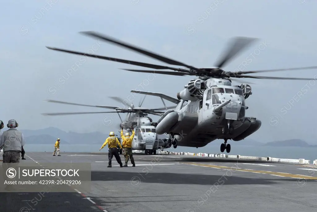 Gulf of Thailand, May 8, 2008 - A Marine MH-53 helicopter takes off from the flight deck of the amphibious assault ship USS Essex (LHD 2). 