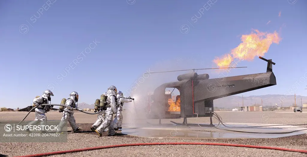 March 13, 2013 - U.S. Air Force Airmen extinguish a fire as part of their training during the operational readiness exercise on Davis-Monthan Air Force Base, Arizona. 
