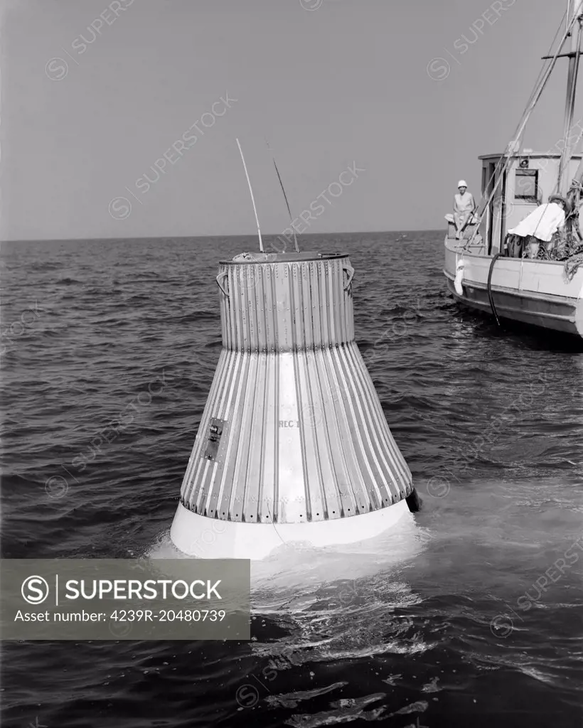June 8, 1959 - A model of the Mercury capsule undergoes floatation tests at NASA's Langley Research Center. 