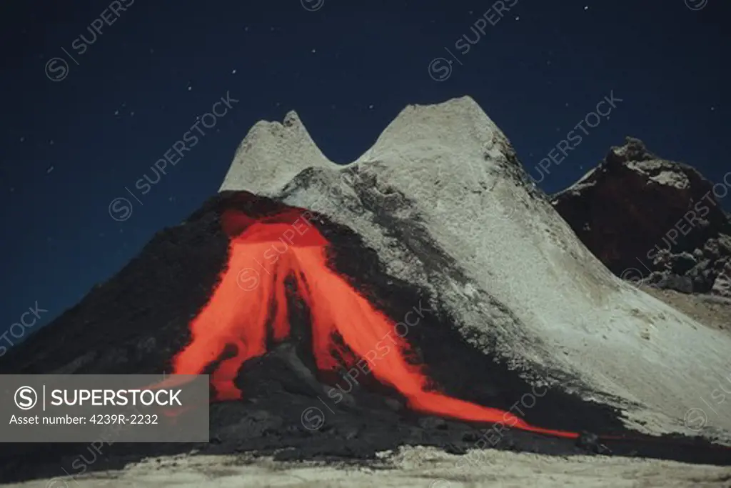 July 2004 - Nighttime eruption of natrocarbonatite lava flows from hornito at Ol Doinyo Lengai volcano, Tanzania, Africa.
