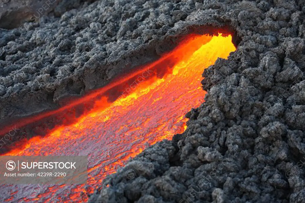December 23, 2007 - Lava flowing from small tunnel on flank of Pacaya volcano, Guatemala.