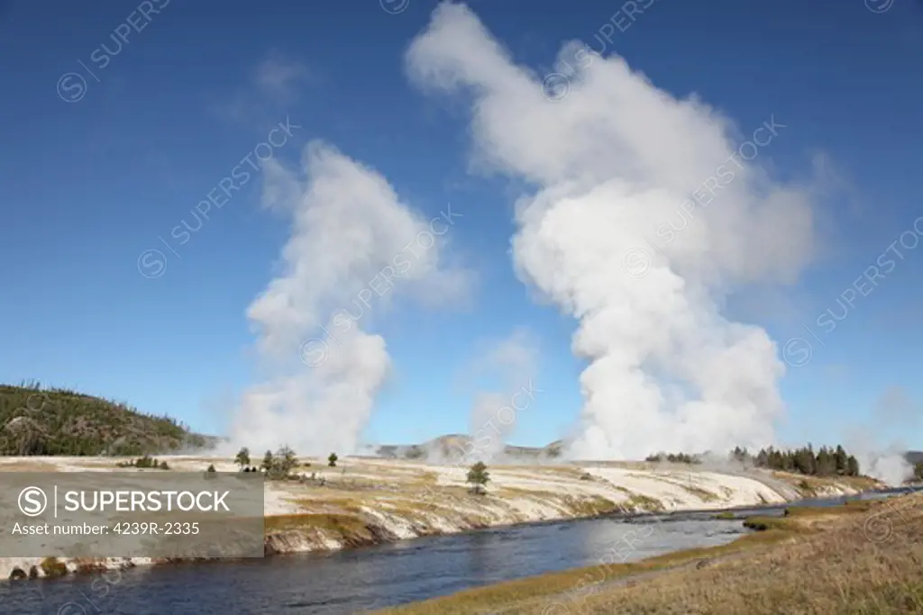 September 12, 2009 - Steam rising over Midway Geyser Basin geothermal area, Yellowstone Caldera, Yellowstone National Park, Wyoming.