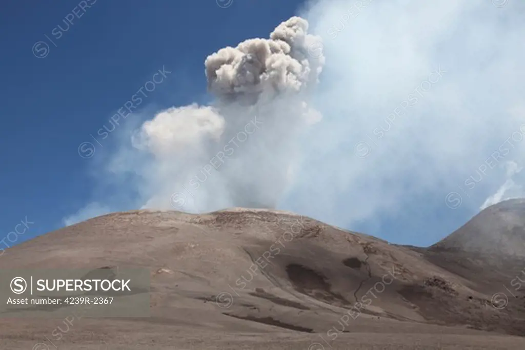 June 25, 2011 - Ash cloud from small strombolian eruption of Bocca Nuova crater, Mount Etna volcano, Sicily, Italy.