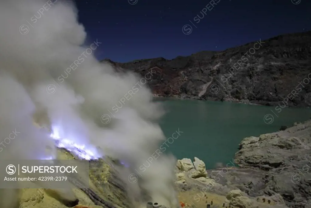 August 12, 2011 - Crater of Kawah Ijen volcano containing highly acidic crater lake and solfatara with burning blue sulphur flames, Java, Indonesia.