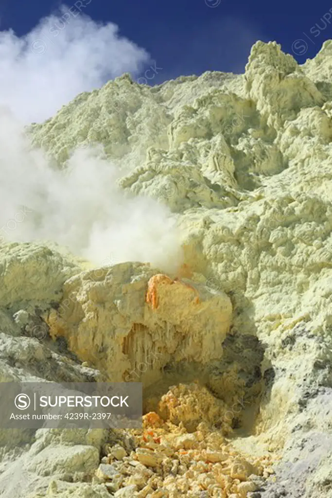 August 13, 2011 - Natural sulphur deposits damaged by miners, Kawah Ijen volcano, Java, Indonesia.