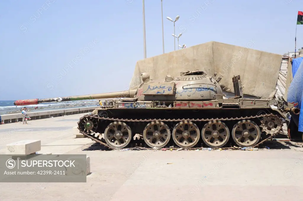 A T-55 tank on the seafront in Benghazi, Libya.  A war betwean Gaddafi army and Libya's Transitional National Council army with air support from NATO started on March 17, 2011.