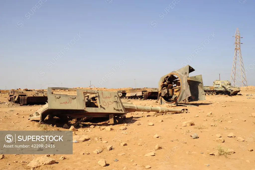 A tracked artillery vehicle destroyed by NATO forces in the desert just outside Benghazi, Libya.  A war betwean Gaddafi army and Libya's Transitional National Council army with air support from NATO started on March 17, 2011.