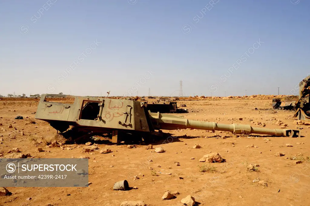 A tracked artillery vehicle destroyed by NATO forces in the desert just outside Benghazi, Libya.  A war betwean Gaddafi army and Libya's Transitional National Council army with air support from NATO started on March 17, 2011.
