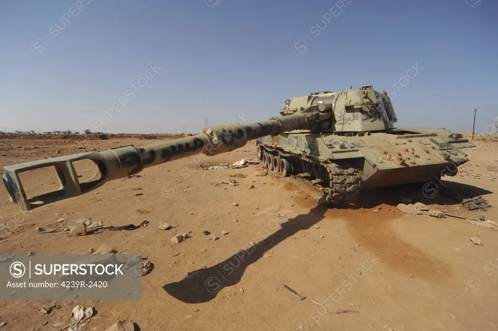 A M109 155mm self-propelled howitzer destroyed by NATO forces in the desert just outside Benghazi, Libya.  A war betwean Gaddafi army and Libya's Transitional National Council army with air support from NATO started on March 17, 2011.