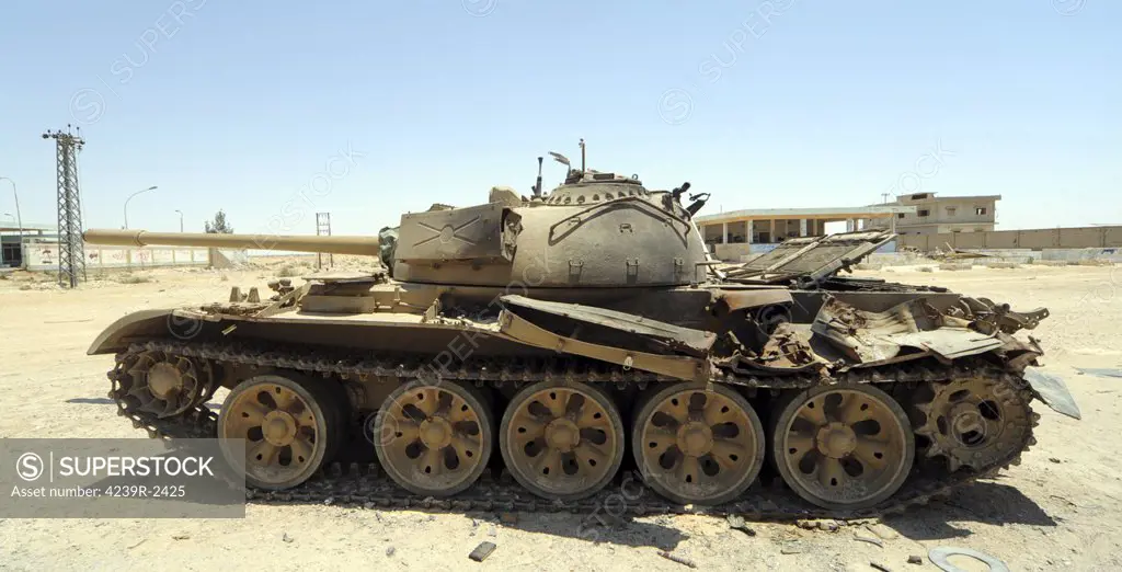 A T-55 tank destroyed by NATO forces in the desert north of Ajdabiya, Libya.  A war betwean Gaddafi army and Libya's Transitional National Council army with air support from NATO started on March 17, 2011.