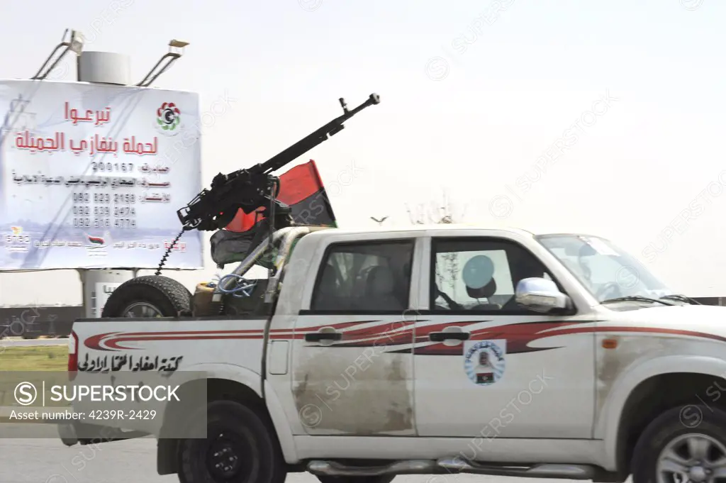 A Free Libyan Army pickup truck with a ZPU-1 anti-aircraft gun in Ajdabiya, Libya.  A war betwean Gaddafi army and Libya's Transitional National Council army with air support from NATO started on March 17, 2011.