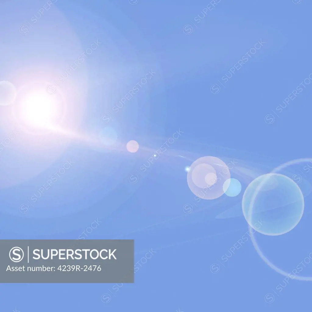 Abstract cosmic image of suns and planets.