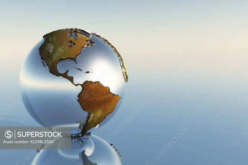 A sphere holding North and South America reflects on a mirror.