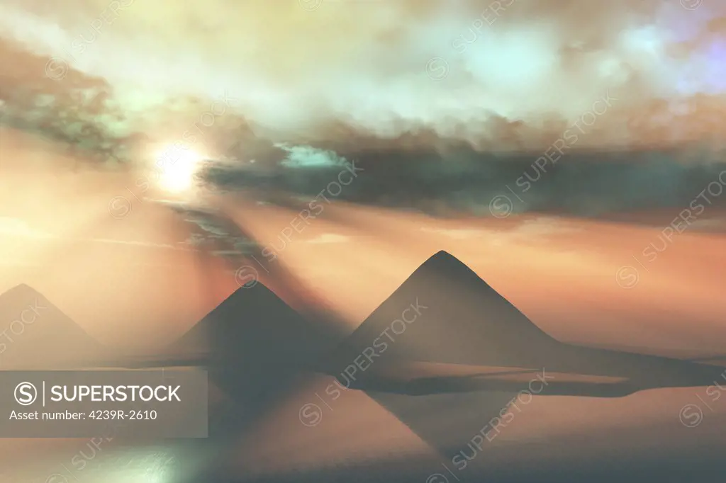 Sunrays shine down on three pyramids along the Nile River on the Giza Plateau.