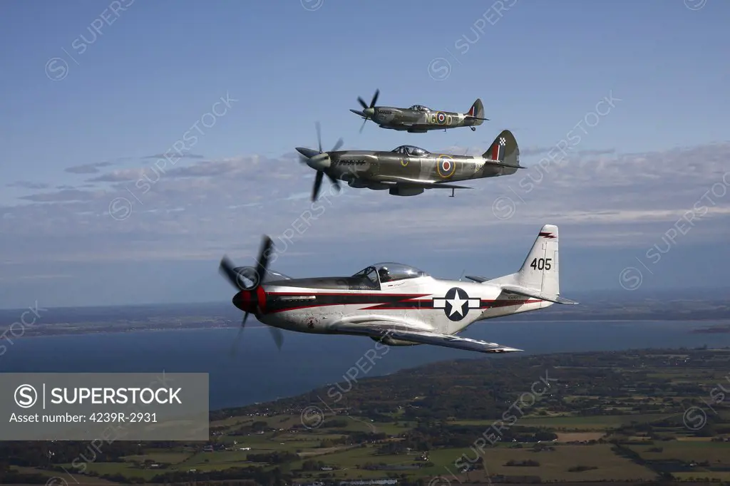 Angelholm, Sweden - North American P-51 Cavalier Mustang with Supermarine Spitfire Mk. XVIII and Mk. XVI fighter warbirds.