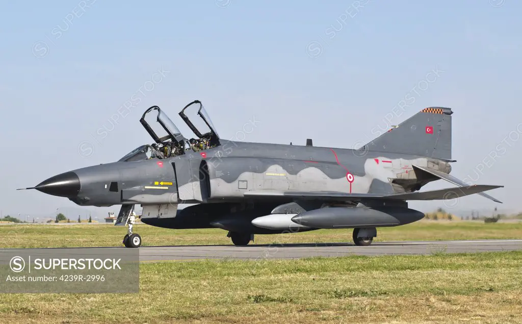 A Turkish Air Force RF-4E taxiing at Izmir Air Base during the Izmir Air Show 2011 in Turkey, celebrating 100 years of the Turkish Air Force.