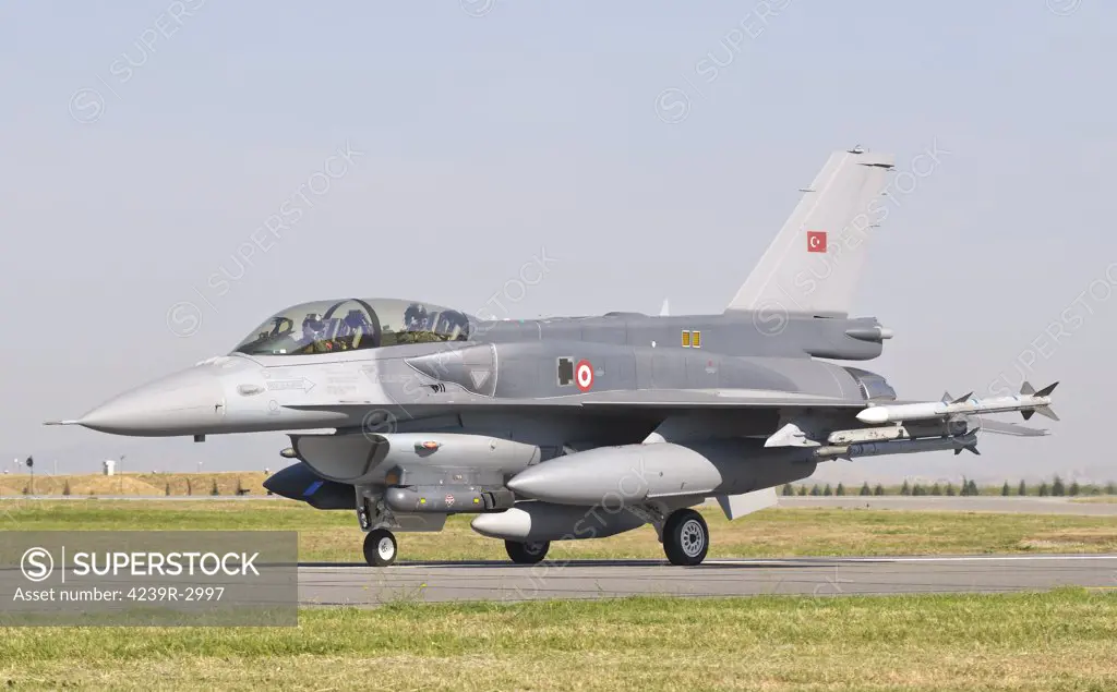 The first of 30 new Turkish-built F-16's by the Turkish Aerospace Industries and Lockheed Martin near Ankara, Turkey.  The aircraft is seen for the first time here at the Izmir Air Show 2011 in Turkey, celebrating 100 years of the Turkish Air Force.