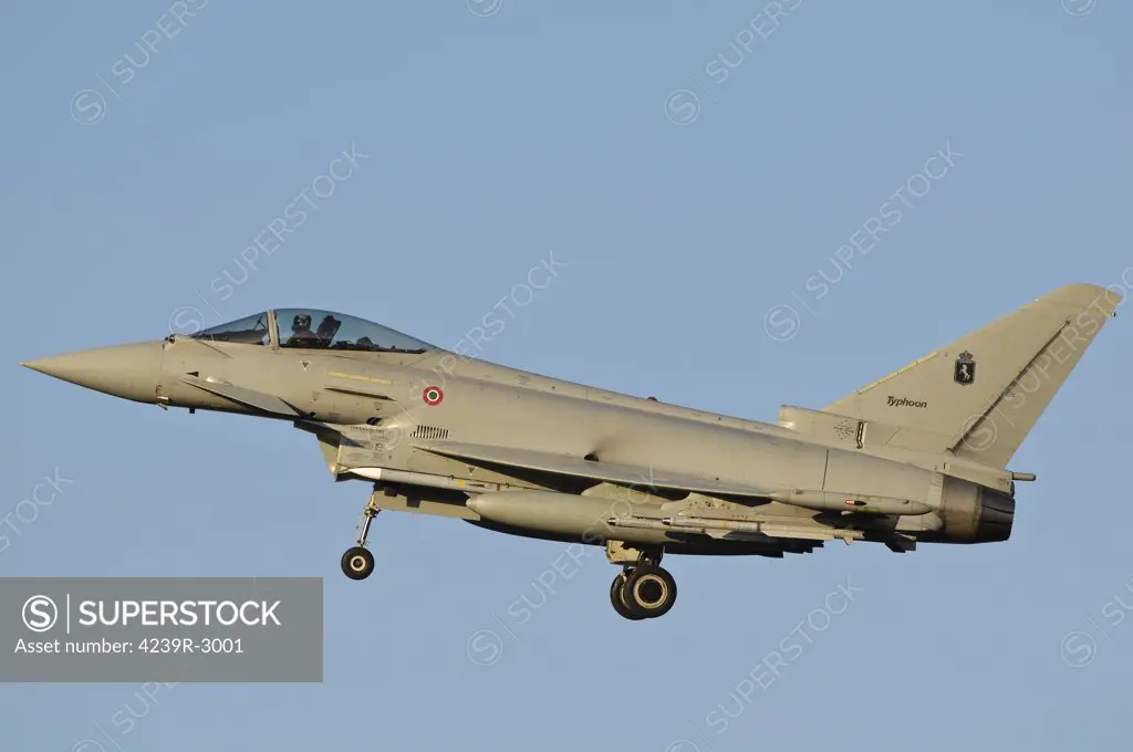 An Italian Air Force Eurofighter Typhoon returns to Trapani Air Base, Sicily, after a civil air patrol mission over Libya during Operation Unified Protector.