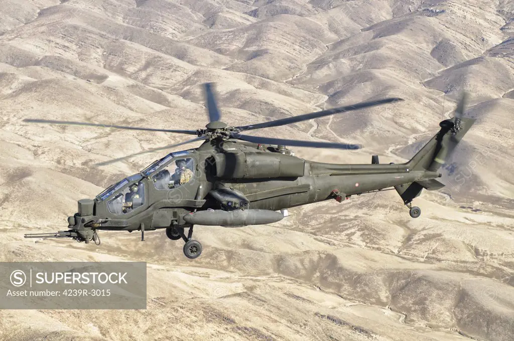 An Italian Army AW129 Mangusta over Afghanistan. The helicopter is assigned to task force Fenice at Forward Operating Base Herat in the Regional Command West.