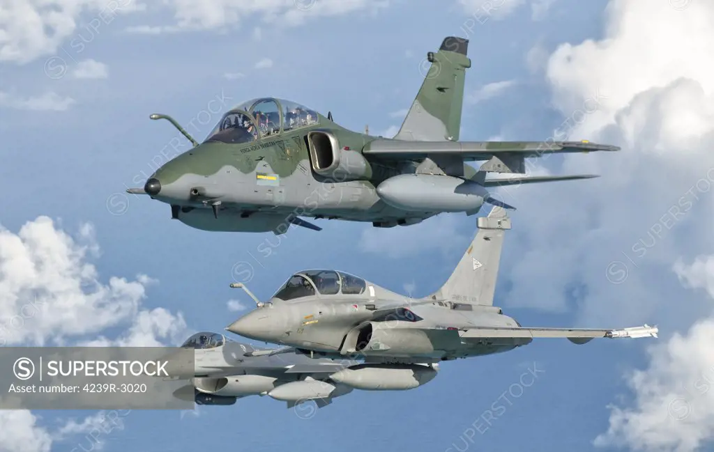 A Brazilian Air Force Embraer A-1B, French Air Force Dassault Rafale, and a U.S. Air Force F-16C Fighting Falcon, from top to bottom, during Cruzeiro Do Sul (CRUZEX) in Brazil. CRUZEX V is a multinational exercise encompassing real means from the Air Forces of Argentina, Brazil, Chile, France, Uruguay, United States, Venezuela and simulated means from Land and Maritime Components that takes place October 28th to November 19th, 2010, on the Northeast coast of Brazil.